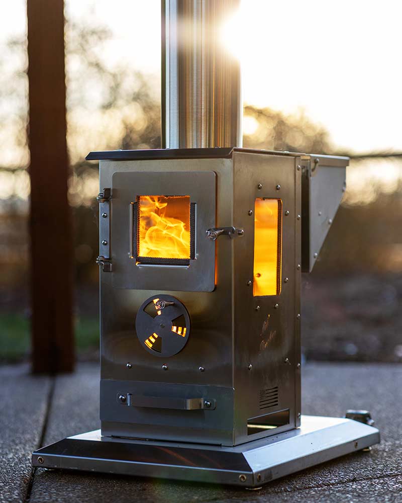 Een Timber Patio Heater demonstreert zijn verwarmingsradius.